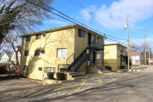 Outdoor shot of yellow housing unit