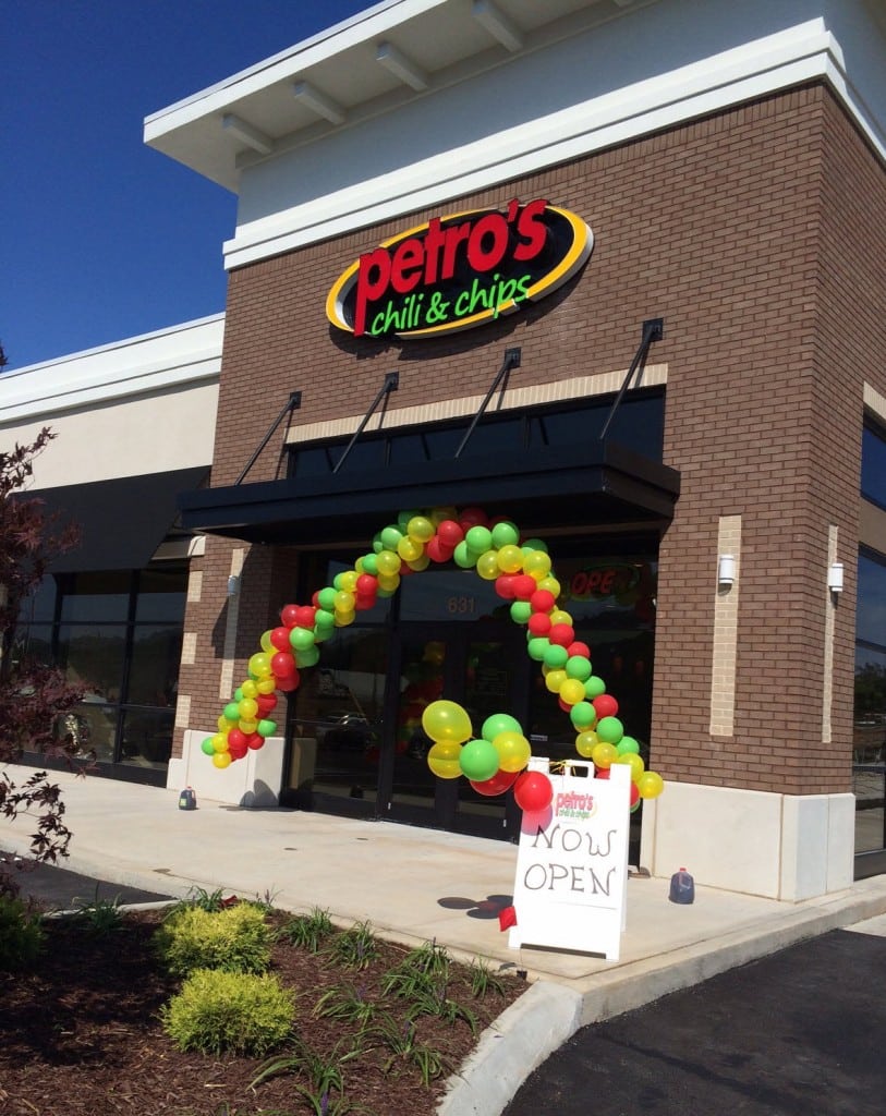 front of Petros store, with balloons for grand opening