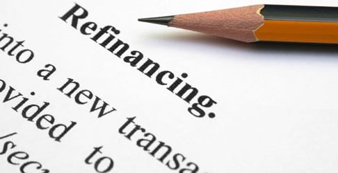 pencil on paper with the word refinancing at the top