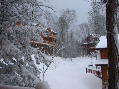 rustic cabins in snow